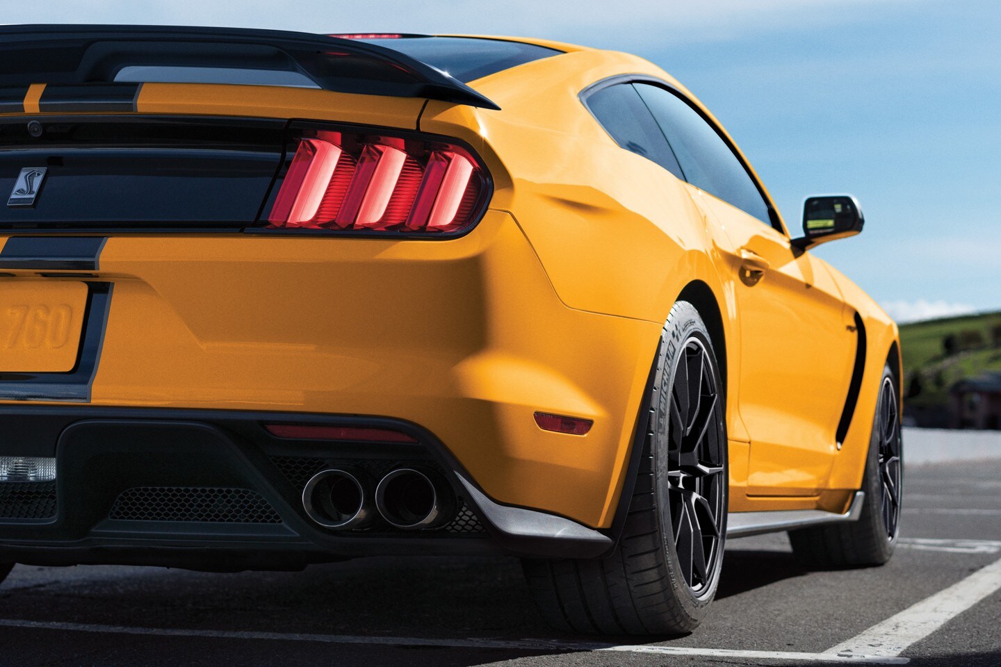 Ford Mustang Shelby GT350 in profile on a mountain road