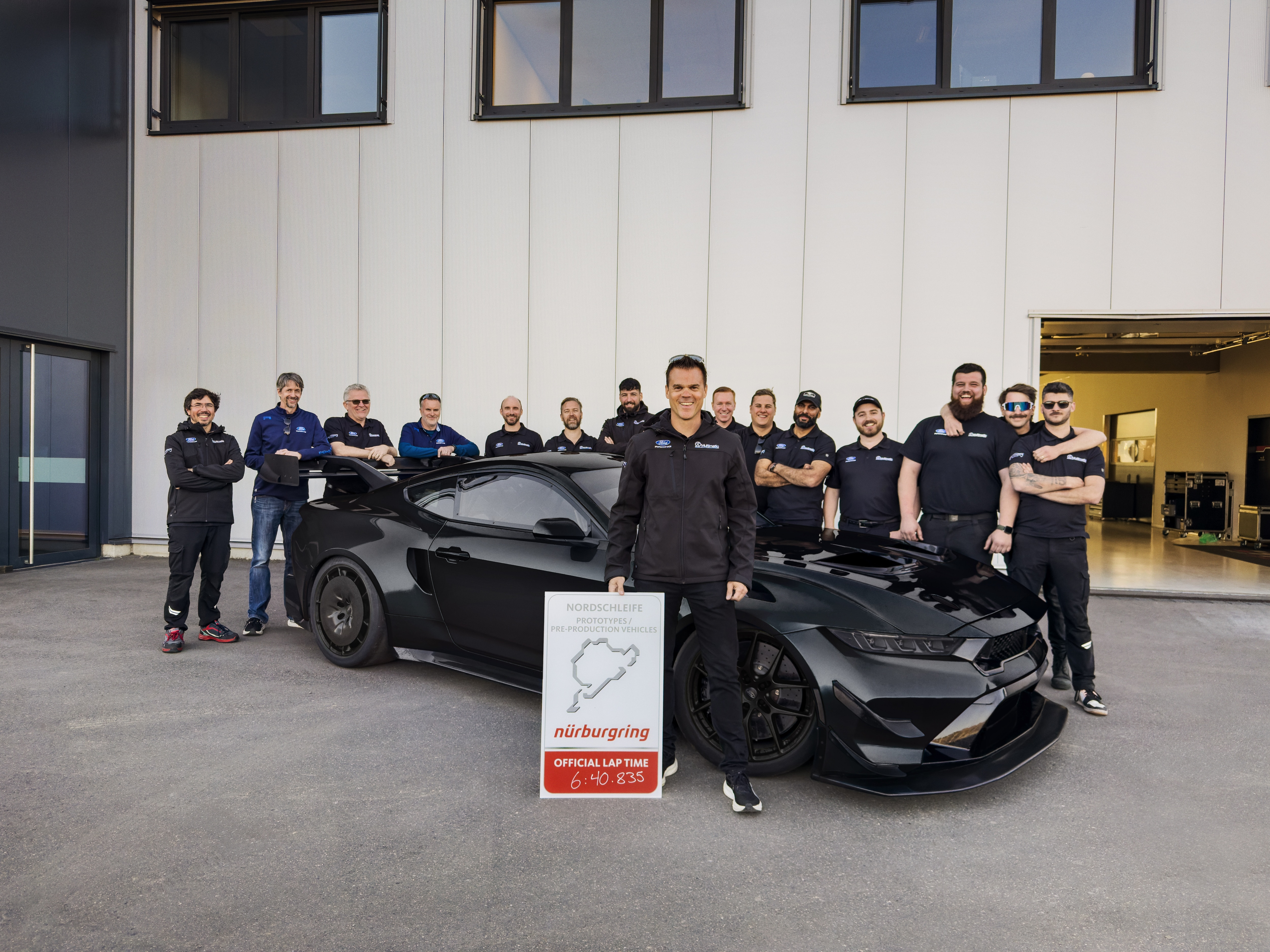 Ford Mustang GTD Competition team celebrating their 6:40.835 Nurburgring lap record